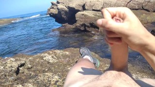 Jerking off a Big Hard Dick overlooking the sea in the Public cove until he cums